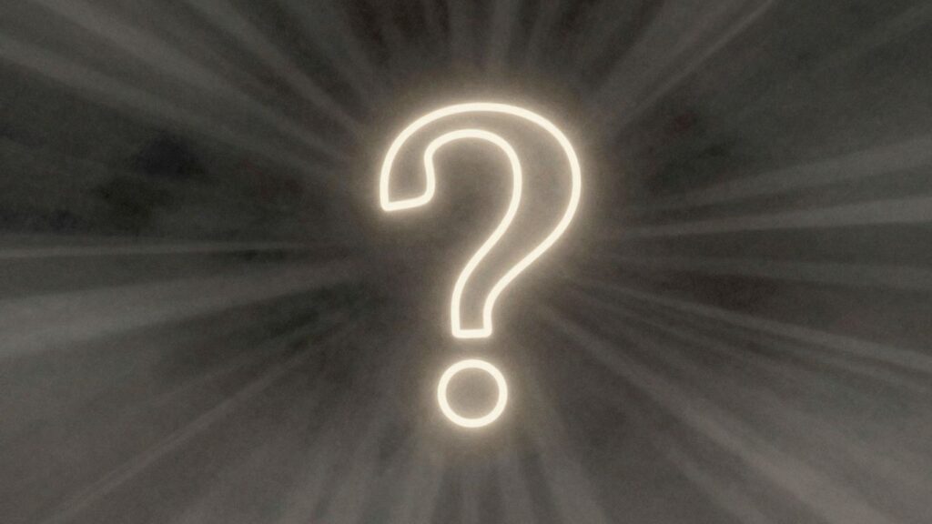 A glowing question mark against a dark, abstract background.