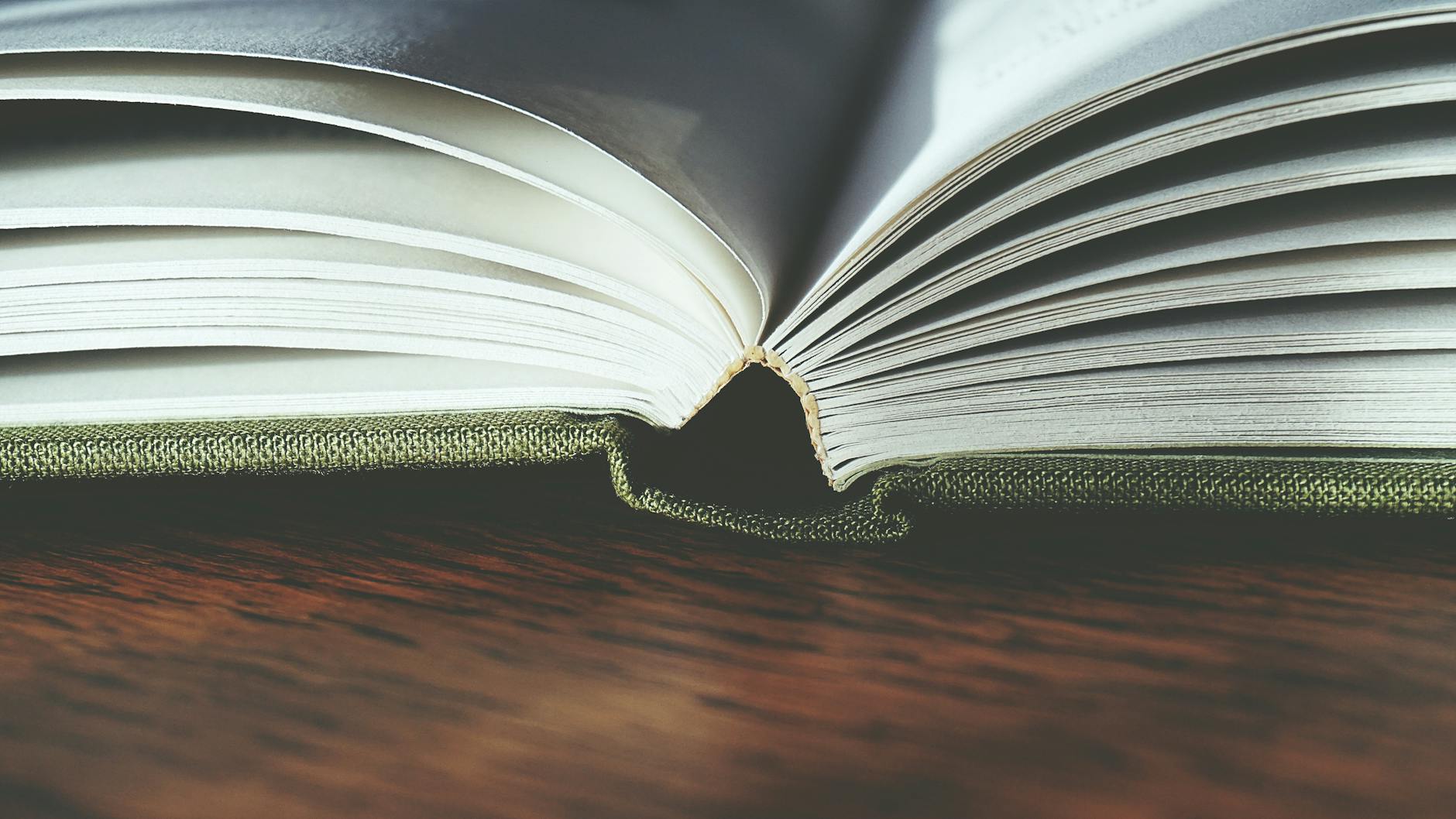 Tim Ferriss — books and self development themed imagery illustrating Tim Ferriss's career and net worth