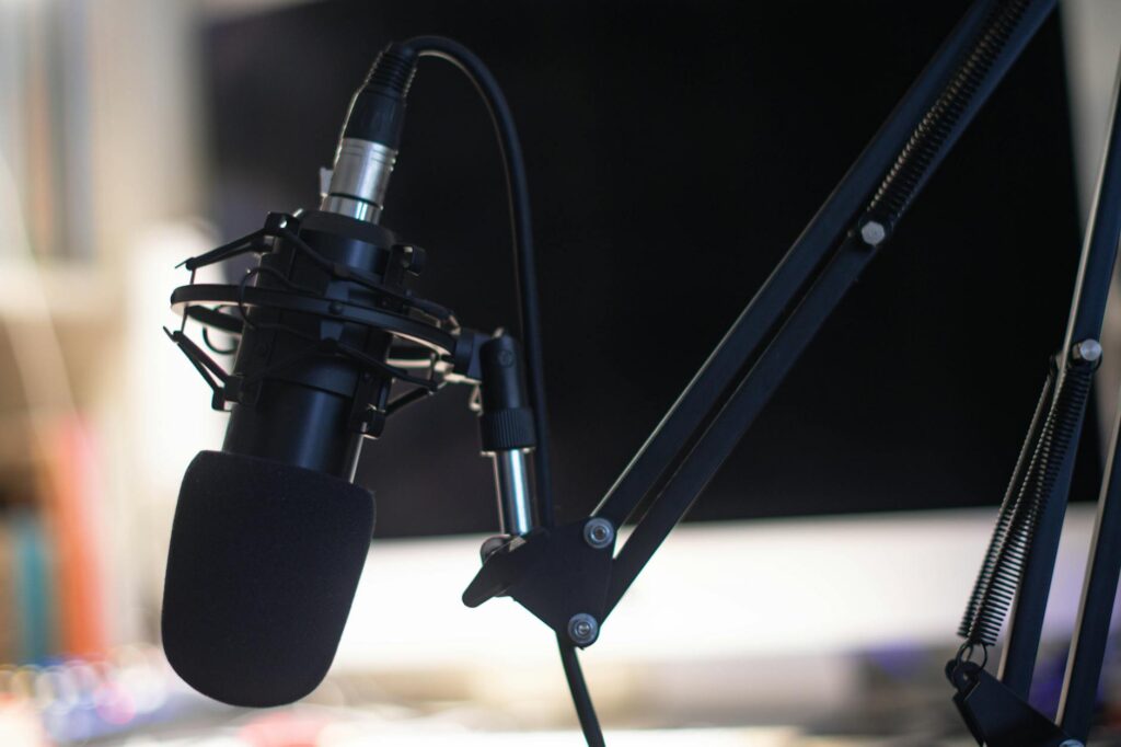 Hala Taha — podcasting and audio themed imagery illustrating Hala Taha's career and net worth