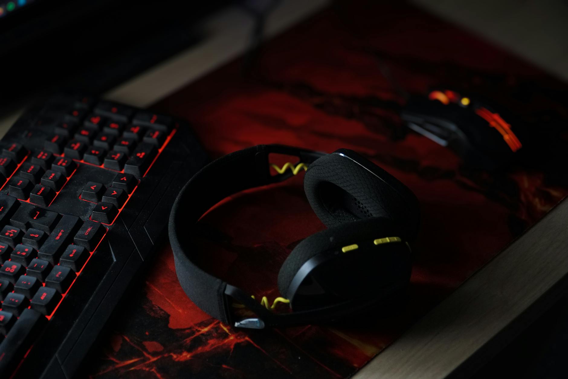 Gaming setup with headphones and keyboard - Pokimane Twitch streaming