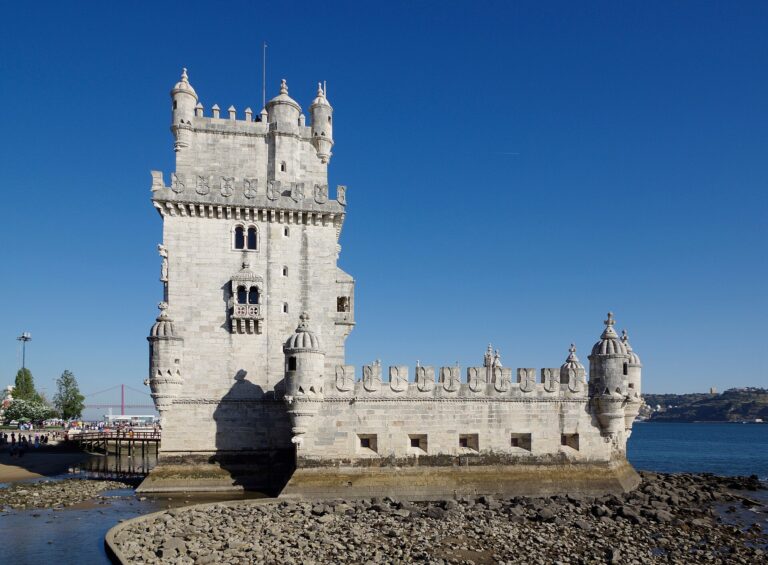 Belém Tower on the Tagus river in Lisbon under a clear blue sky