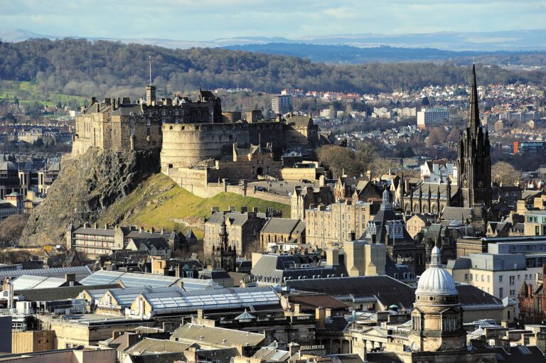Edinburgh Castle on Castle Rock above the rooftops of Edinburgh's Old Town