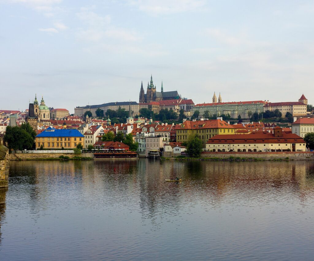 Prague Castle and St. Vitus Cathedral seen across the Vltava river from Charles Bridge