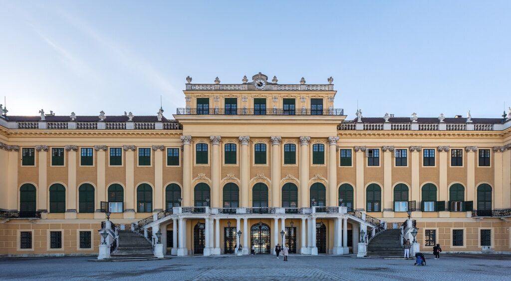 Main façade of Schönbrunn Palace in Vienna seen from the Parade Court