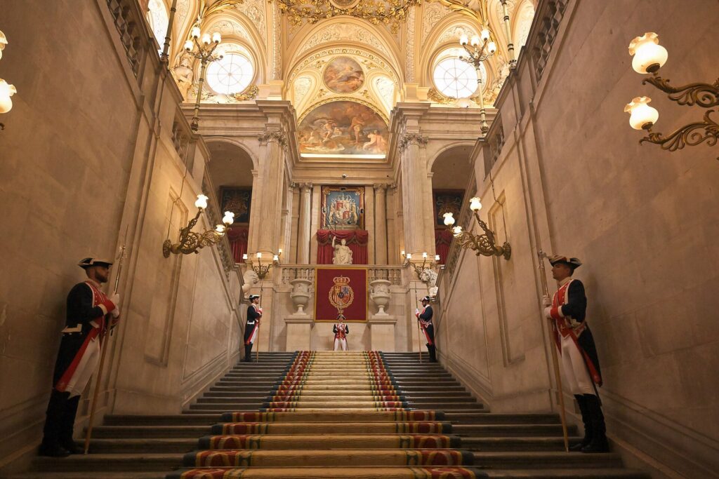 Main staircase of the Royal Palace of Madrid with Royal Guard soldiers