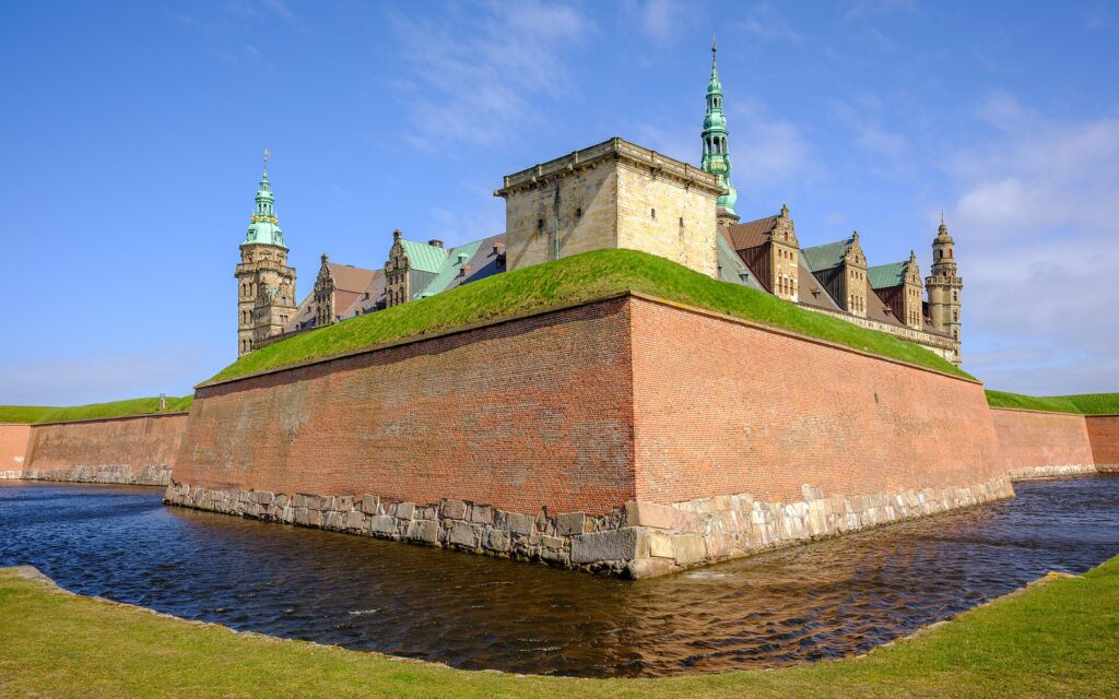 Kronborg Castle in Helsingør behind its brick bastion and moat