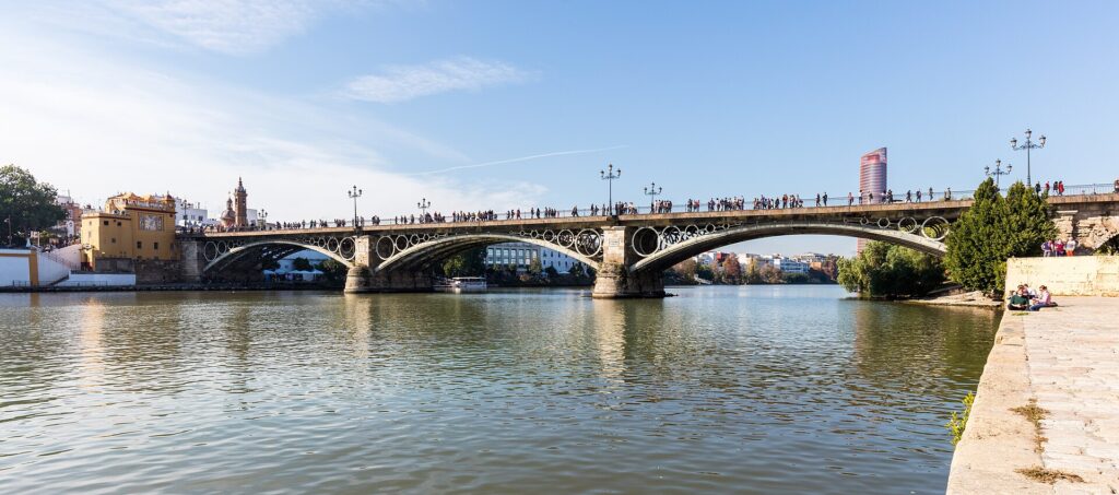 The iron Isabel II Bridge over the Guadalquivir river, linking central Seville with Triana